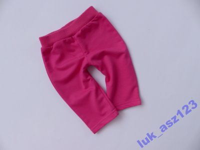 różowe spodnie dresowe r. 68 j. NOWE