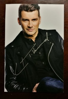 Zdjęcie Tomasza Kammela z autografem