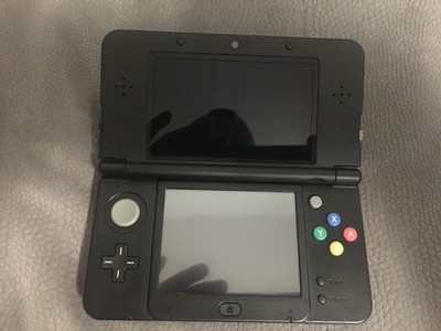 New Nintendo 3DS Czarna plus 4 Gry
