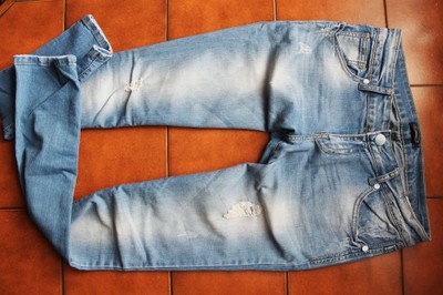 nowe spodnie rurki jeansy dziury M/L