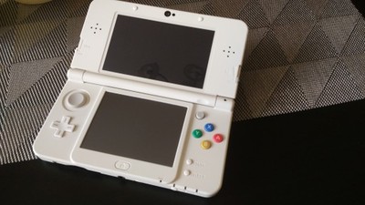 Nintendo New 3DS + 7 gier + Akcesoria