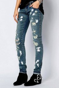 A8339: Spodnie TRIPP NYC jeansy rurki dziury W24